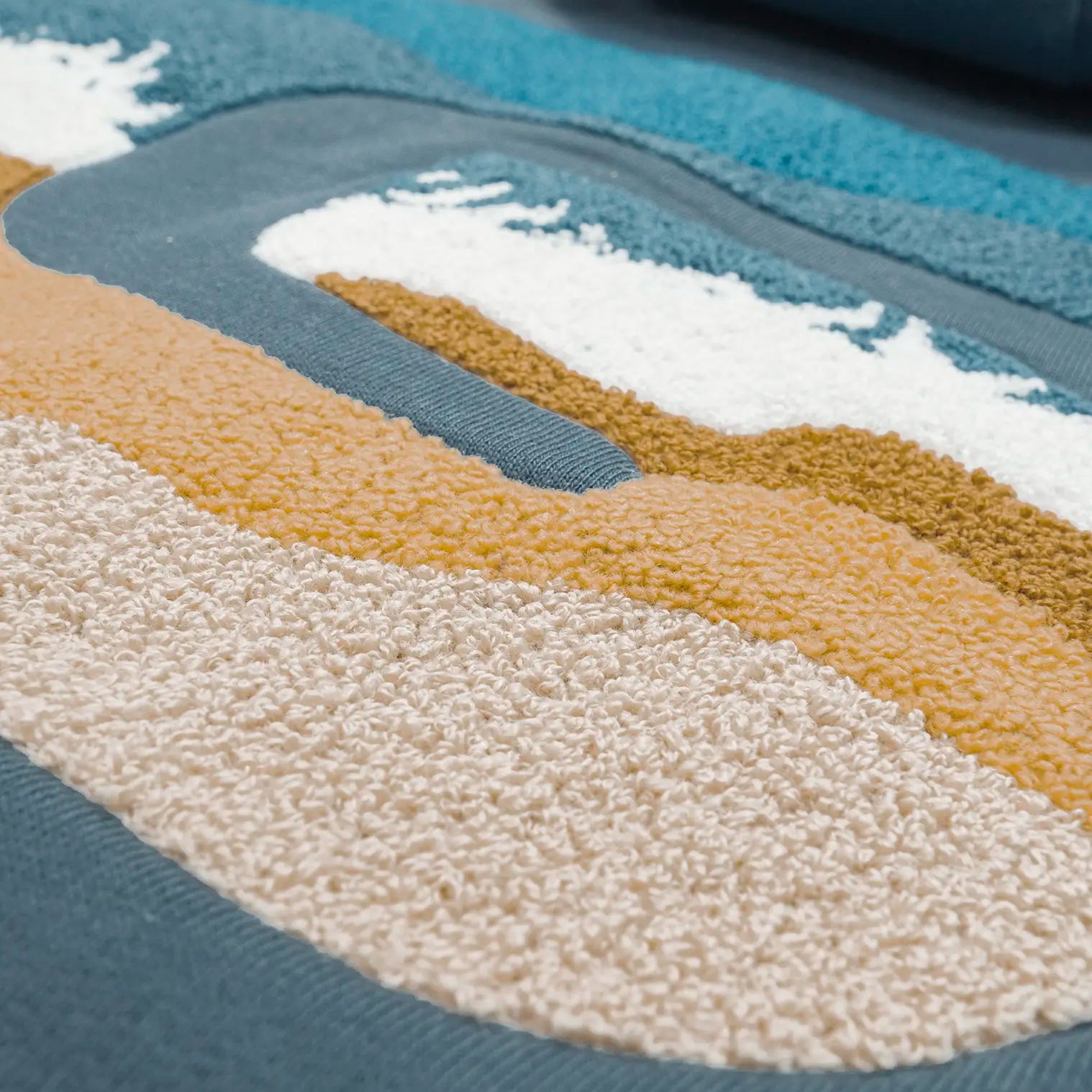 SudaderaS_Organica_Glassy_Ocean_bordado_back