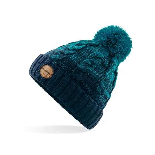 Explore the winter with the Glassy beanie in the mountains